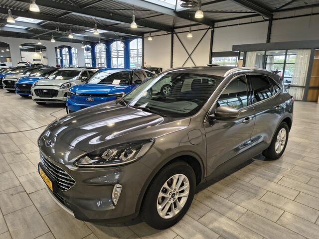 Ford KUGA 2.5 PHEV 225 pk Titanium | Trekhaak | Camera's | Adapt. cruise | Navi | Clima | Cruise | 4 seiz. banden | Dealer onderh.