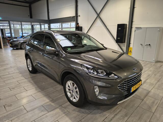 Ford KUGA 2.5 PHEV 225 pk Titanium | Trekhaak | Camera's | Adapt. cruise | Navi | Clima | Cruise | 4 seiz. banden | Dealer onderh.