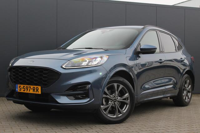 Ford KUGA 2.5 PHEV ST-Line X | Incl. 12 maanden garantie | Trekhaak | B&O audio | Achteruitrijcamera | Camera voor | Parkeersensoren | Cruise control | DAB | Elektrische kofferklep | Lichtmetalen velgen | Climate control | Bluetooth | Airco