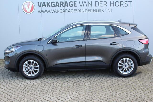 Ford KUGA 2.5-225 pk PHEV Titanium X Plug-In Hybrid-Automaat. Hybride rijden voor een reële prijs ! Adapt. Cruise Cntrl, Climate Cntrl, Navigatie, Side- en Lane assist, Telefoonvoorb., Keyless entry/keyless go, Stoel- en voorraamverw., Camera v+a, All season banden