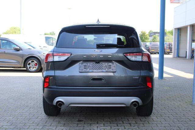 Ford KUGA 2.5 PHEV Titanium X | Wegklapbare trekhaak | Winter Pack | Adaptive cruise control | Dodehoeksesoren | Half leder | Bang&Olufsen