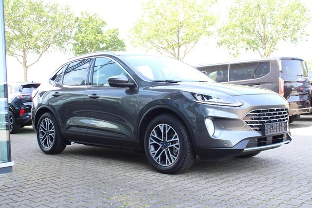 Ford KUGA 2.5 PHEV Titanium X | Wegklapbare trekhaak | Winter Pack | Adaptive cruise control | Dodehoeksesoren | Half leder | Bang&Olufsen