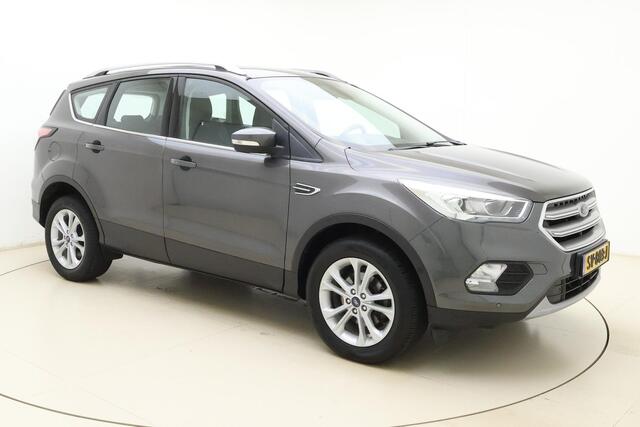 Ford KUGA 1.5 EcoBoost Titanium | Trekhaak | Achteruitrijcamera | Airco | Navigatie | Elektrische achterklep | Cruise control | Start/Stop bediening | Climate control | Parkeersensoren | Lederen/stof interieur | Stuurbediening