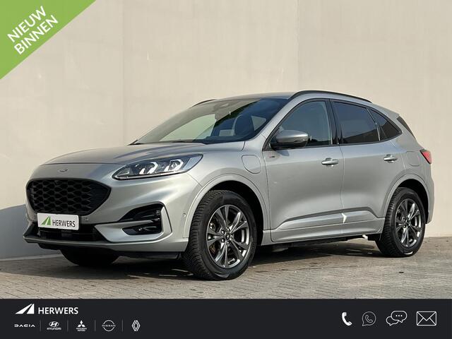Ford KUGA 2.5 PHEV ST-Line / Dealer onderhouden / 1.500 kg trekgewicht / Navigatie / Stuur-, stoel- en achterbank verwarming / HUD / Camera / 18" LM wielen & All Season banden /