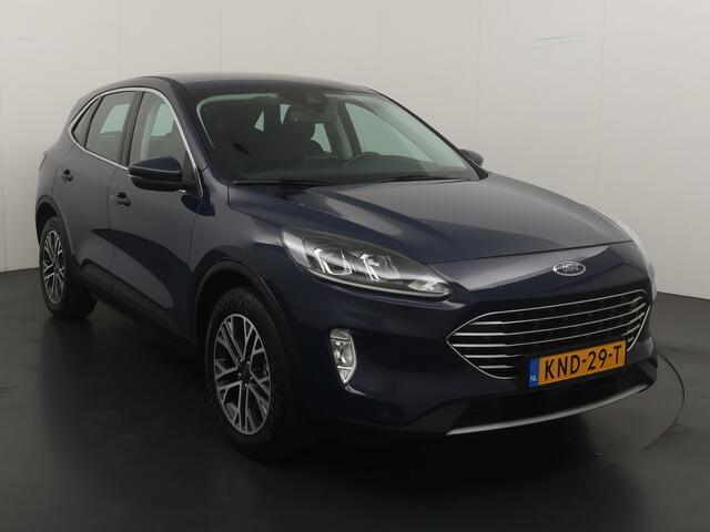 Ford KUGA 2.5 PHEV 225pk Titanium | Winterpack | Cruise control | Climate Control | Parkeersens V&A | Apple carplay / Android auto |