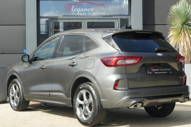 Ford KUGA 2.5 PHEV ST-Line | 243PK | Winterpakket | ACC | Camera | 2100KG | Kortom: een zeer complete, krachtige en moderne Kuga ST-Line met slechts 15 km, 243 pk, plug-in hybride techniek en maar liefst 2.100 kg trekgewicht. Een bijzonder interessante combinatie van