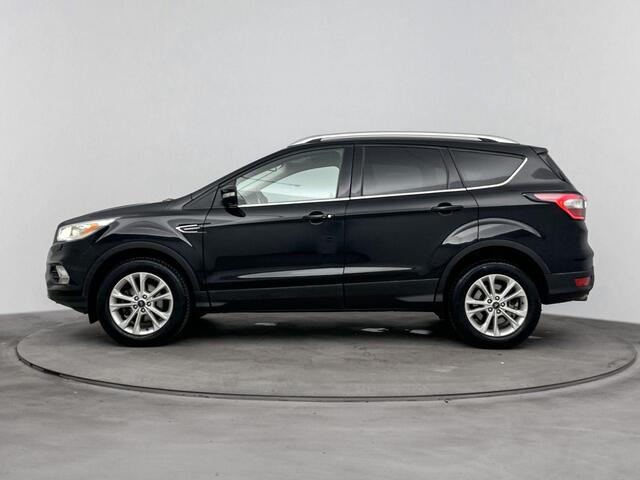 Ford KUGA 1.5 EcoBoost Titanium | Stoel & Stuurverwarming | Trekhaak | Parkeersensoren | Climate & Cruise Control | Navigatie | Keyless Entry | Voorruitverwarming |