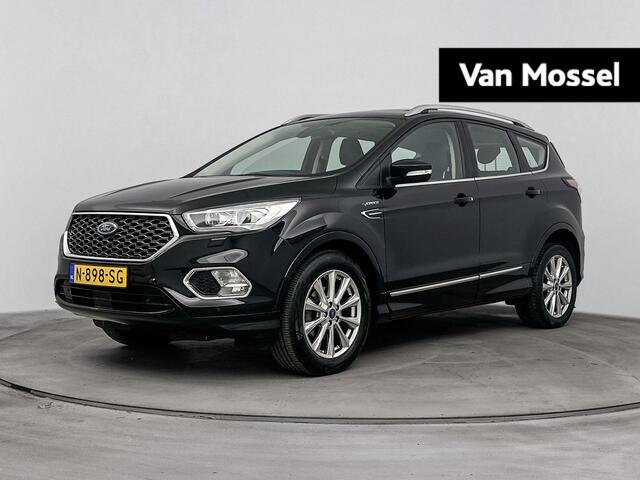 Ford KUGA 1.5 EcoBoost Vignale | Pack Winter | Memory Stoelen | Elektrisch Verstelbare Voorstoelen | Luxe Leder | Achteruitrijcamera | Elektrische Achterklep | Schuif-/ Kantel Panoramadak | Keyless | Parkeersensoren Voor en Achter | Sony Audio |