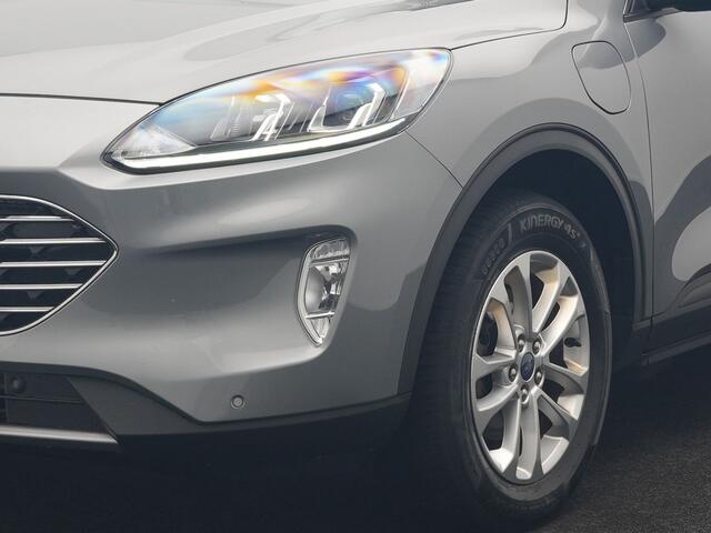 Ford KUGA 2.5 PHEV Titanium 225pk Dealer O.H. | Trekhaak Afn. | Panodak | Camera | Stoelen & Stuur Verwarmd | Apple Carplay | Keyless | Virtual | Cruise Control | Navigatie | DAB | Plug In Hybrid |