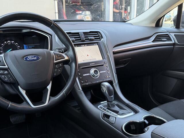 Ford MONDEO Wagon BWJ 2019 2.0 141 PK IVCT HEV Titanium APPLE CARPLAY | ANDROID AUTO | NAVI | CLIMA | CRUISE | ELEKTRISCHE STOEL | STOELVERW. | VOORRUITVERW. | ELEKTRISCHE ACHTERKELP | CAMERA | DODE HOEK | LMV | PDC