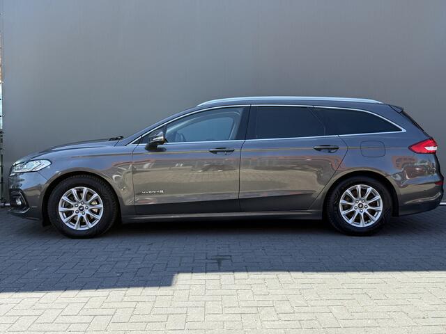 Ford MONDEO Wagon BWJ 2019 2.0 141 PK IVCT HEV Titanium APPLE CARPLAY | ANDROID AUTO | NAVI | CLIMA | CRUISE | ELEKTRISCHE STOEL | STOELVERW. | VOORRUITVERW. | ELEKTRISCHE ACHTERKELP | CAMERA | DODE HOEK | LMV | PDC