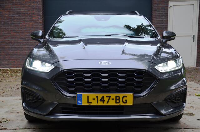 Ford MONDEO Wagon 2.0 IVCT HEV ST-Line Navi/Pdc/Ecc/Stoelverwarming/Apple Carplay/Android Auto/ Privacy Glass/Elektrisch verstelb. bestuurdersstoel met geheugen/Achteruitrijcamera