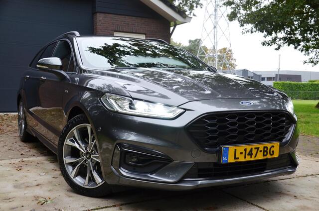 Ford MONDEO Wagon 2.0 IVCT HEV ST-Line Navi/Pdc/Ecc/Stoelverwarming/Apple Carplay/Android Auto/ Privacy Glass/Elektrisch verstelb. bestuurdersstoel met geheugen/Achteruitrijcamera