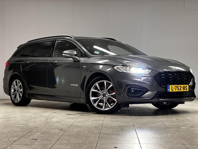 Ford MONDEO Wagon 2.0 IVCT HEV ST-Line/ Dealer Onderhouden!/ Automaat/ Zwarte Hemel/ Camera/ Elek.Klep/ Stoel+Voorruitverw./ Elek.Stoel+Memory/ 18''LMV/ LED Koplampen/ Keyless/ Dodehoekdet./ Apple+Android/ Clima/ Navi/ Cruise/ PDC.