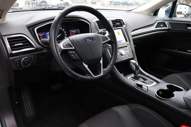 Ford MONDEO Wagon 2.0 IVCT HEV Titanium 1e Eigenaar | Volledig Onderh | BTW | PANO | Sfeer | Camera | Trekhaak | Stoelverwarming | Elek Klep | Ad Cruise | Keyless | Full Led | Navi | PDC | DAB Radio