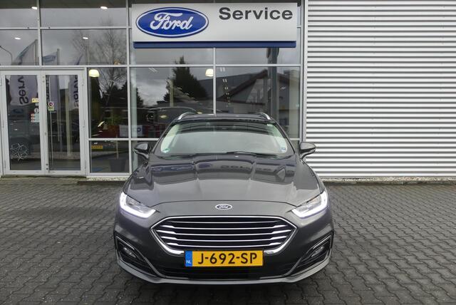 Ford MONDEO Wagon 2.0 IVCT HEV Titanium ELEKT. TREKHAAK (750KG), WINTER PACK, MEMORY, CRUISE, CLIMA, NAVI, CAMERA, PDC V&A, APPLE CARPLAY/ANDROID AUTO, BLIS, KEYLESS, ELEKT. PASSAGIERSSTOEL, ELEKT. ACHTERKLEP, ADAPTIEVE KOPLAMPEN, LANE ASSIST, 57.812KM