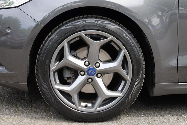 Ford MONDEO 2.0 IVCT HEV Titanium RUITVERWARMING ALL-SEASONS NAVI DAB 18"LMV SFEERVERLICHTING 2xPDC NAP ENZ.