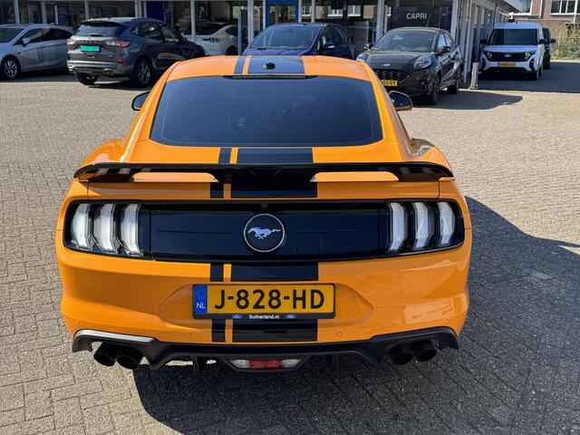Ford MUSTANG Fastback 2.3 EcoBoost 289pk | Custom Pack Black | Lederen bekleding | Navigatie full map | Voorstoelen verwarmd en geventileerd | Audio installatie premium | Twister Orange