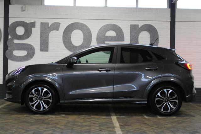 Ford PUMA 1.0 EcoBoost Hybrid ST-Line | Incl. 12 maanden garantie | Stoelverwarming | Achteruitrij camera | DAB radio | Adaptive cruise | Nieuwstaat | Nederlandse auto | Zwarte hemel | Getint glas | Parkeer hulp | Stuurverwarming |