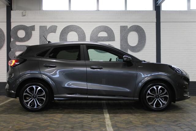 Ford PUMA 1.0 EcoBoost Hybrid ST-Line | Incl. 12 maanden garantie | Stoelverwarming | Achteruitrij camera | DAB radio | Adaptive cruise | Nieuwstaat | Nederlandse auto | Zwarte hemel | Getint glas | Parkeer hulp | Stuurverwarming |
