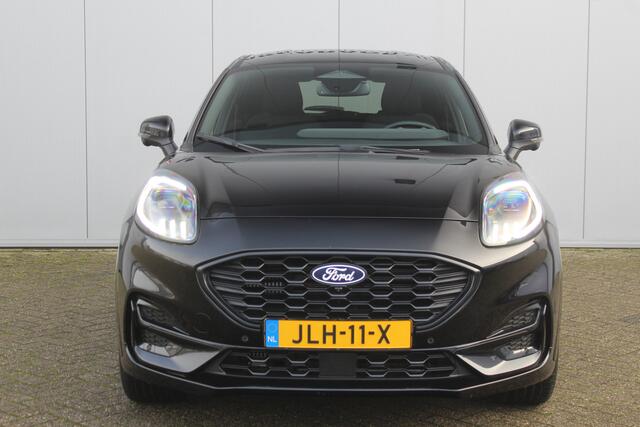Ford PUMA 1.0-125pk EcoBoost Mild-Hybrid ST-Line. Mooie luxe hoogzitter ! Slechts 12.200km ! Autm. airco, adapt. cruise control, stoel-, stuur- en voorraamverw., navigatie, telefoonvoorb., LM wielen, elektr. achterklep, LED verl., camera, pdc v+a etc.