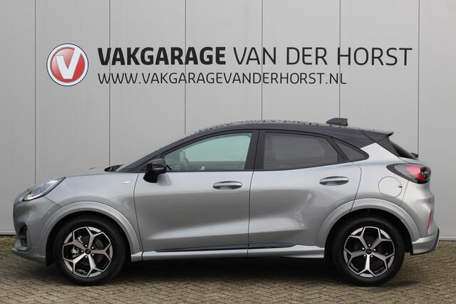 Ford PUMA 1.0-125pk EcoBoost Mild-Hybrid ST-Line, two-tone. Alwéér een prachtige hoogzitter met slechts 12.000km ! Autm. airco, camera 360gr., LM wln, side- en lane assist, adaptieve cruise cntrl, navigatie, telefoonvoorb., stoel-, stuur-- en voorraamverw. etc.