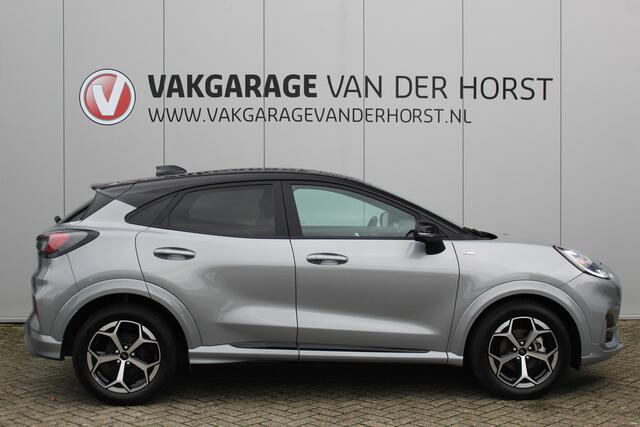 Ford PUMA 1.0-125pk EcoBoost Mild-Hybrid ST-Line, two-tone. Alwéér een prachtige hoogzitter met slechts 12.000km ! Autm. airco, camera 360gr., LM wln, side- en lane assist, adaptieve cruise cntrl, navigatie, telefoonvoorb., stoel-, stuur-- en voorraamverw. etc.