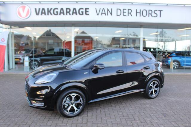 Ford PUMA 1.0-125pk EcoBoost Mild-Hybrid ST-Line. Mooie luxe hoogzitter ! Slechts 9.950km ! Autm. airco, adapt. cruise control, stoel-, stuur- en voorraamverw., navigatie, telefoonvoorb., LM wielen, elektr. achterklep, LED verl., camera, pdc v+a etc.