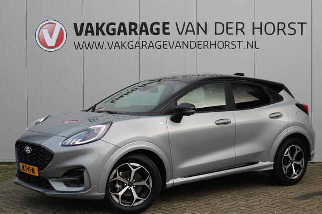 Ford PUMA 1.0-125pk EcoBoost Mild-Hybrid ST-Line, two-tone. Alwéér een prachtige hoogzitter met slechts 8.300km ! Autm. airco, camera 360gr., LM wln, side- en lane assist, adaptieve cruise cntrl, navigatie, telefoonvoorb., stoel-, stuur- en voorraamverw. etc.
