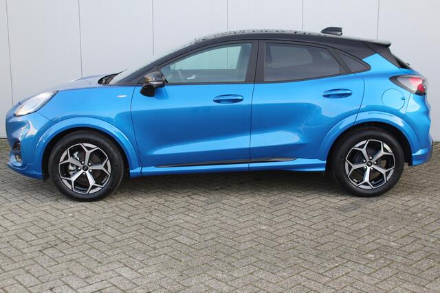 Ford PUMA 1.0-125pk EcoBoost Mild-Hybrid ST-Line. Mooie luxe hoogzitter ! Slechts 9.500km ! Autm. airco, adapt. cruise control, stoel-, stuur- en voorraamverw., navigatie, telefoonvoorb., LM wielen, elektr. achterklep, LED verl., camera 360gr, pdc v+a etc.