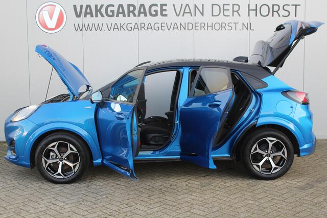 Ford PUMA 1.0-125pk EcoBoost Mild-Hybrid ST-Line. Mooie luxe hoogzitter ! Slechts 9.500km ! Autm. airco, adapt. cruise control, stoel-, stuur- en voorraamverw., navigatie, telefoonvoorb., LM wielen, elektr. achterklep, LED verl., camera 360gr, pdc v+a etc.