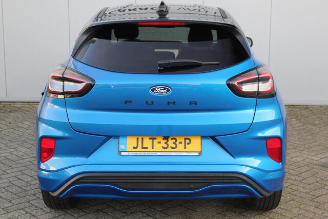 Ford PUMA 1.0-125pk EcoBoost Mild-Hybrid ST-Line. Mooie luxe hoogzitter ! Slechts 9.500km ! Autm. airco, adapt. cruise control, stoel-, stuur- en voorraamverw., navigatie, telefoonvoorb., LM wielen, elektr. achterklep, LED verl., camera 360gr, pdc v+a etc.