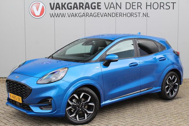 Ford PUMA 1.0-125pk EcoBoost Hybrid ST-Line X. Zeer nette wagen ! Slechts 35.000km ! Autm. airco, cruise cntrl, premium soundsyst., LED verl., navigatie, telefoonvoorb., trekhaak afneemb., stoel, stuur en voorraamverwarming. etc.