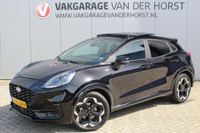 Ford PUMA 1.0-125pk EcoBoost Mild-Hybrid ST-Line X. Fabr. garantie t/m 13-11-2029 ! Slechts 4.000km ! Autm. airco, adapt. cruise cntrl, navigatie, telefoonvoorb., elektr. pano-dak, stoel-, stuur- en voorraamverw., side- en lane assist, LED verl. etc.