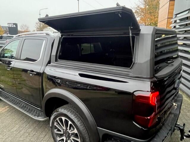 Ford RANGER 3.0 V6 AUT 240 PK 4X4 EURO 6 VAN 3500KG PLATINUM BPM VRIJ ! 2024 V.A ¤ 63.900 EXCL LAATSTE KANS VOOR BPM VRIJE BEDRIJFSAUTO - LEDER-NAVI CLIMA ADAPTIVE CRUISE - 3500 KG TREKKRACHT afgebeelde multi functionele hardtop en lades tegen meerprijs . we richten