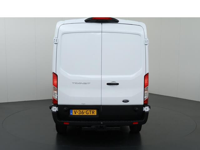 Ford TRANSIT 350 2.0 TDCI L3H2 Trend Navigatie | Stoelverwarming | Trekhaak 2500 KG AHW | Airco | 3-Zits | NIEUW | Carplay - Android Auto | Laadruimte Pakket | Cruise Control | Multifuntioneel Stuurwiel
