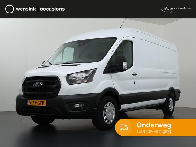 Ford TRANSIT 350 2.0 TDCI L3 H2 Trend Navigatie | Stoelverwarming | Trekhaak 2500 KG AHW | Airco | 3-Zits | NIEUW | Carplay - Android Auto | Laadruimte Pakket | Cruise Control | Multifuntioneel Stuurwiel