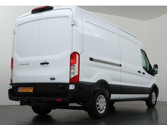 Ford TRANSIT 350 2.0 TDCI L3 H2 Trend Navigatie | Stoelverwarming | Trekhaak 2500 KG AHW | Airco | 3-Zits | NIEUW | Carplay - Android Auto | Laadruimte Pakket | Cruise Control | Multifuntioneel Stuurwiel