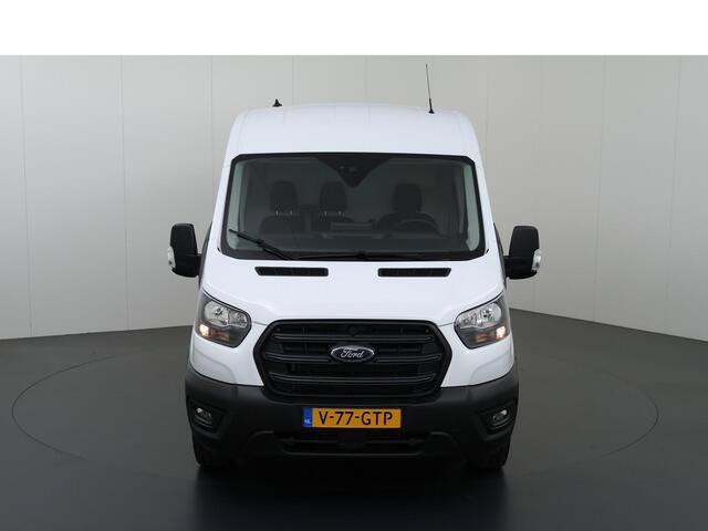 Ford TRANSIT 350 2.0 TDCI L3 H2 Trend Navigatie | Stoelverwarming | Trekhaak 2500 KG AHW | Airco | 3-Zits | NIEUW | Carplay - Android Auto | Laadruimte Pakket | Cruise Control | Multifuntioneel Stuurwiel
