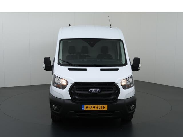 Ford TRANSIT 350 2.0 TDCI L3 H2 Trend Navigatie | Stoelverwarming | Trekhaak 2500 KG AHW | Airco | 3-Zits | NIEUW | Carplay - Android Auto | Laadruimte Pakket | Cruise Control | Multifuntioneel Stuurwiel