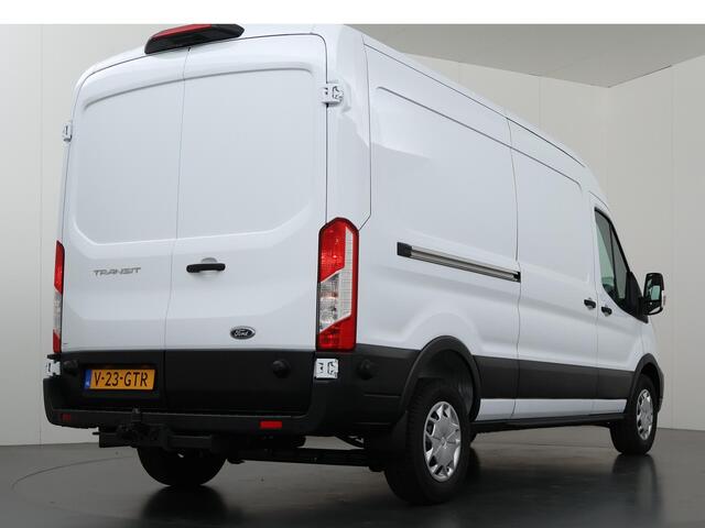 Ford TRANSIT 350 2.0 TDCI L3 H2 Trend Navigatie | Stoelverwarming | Trekhaak 2500 KG AHW | Airco | 3-Zits | NIEUW | Carplay - Android Auto | Laadruimte Pakket | Cruise Control | Multifuntioneel Stuurwiel