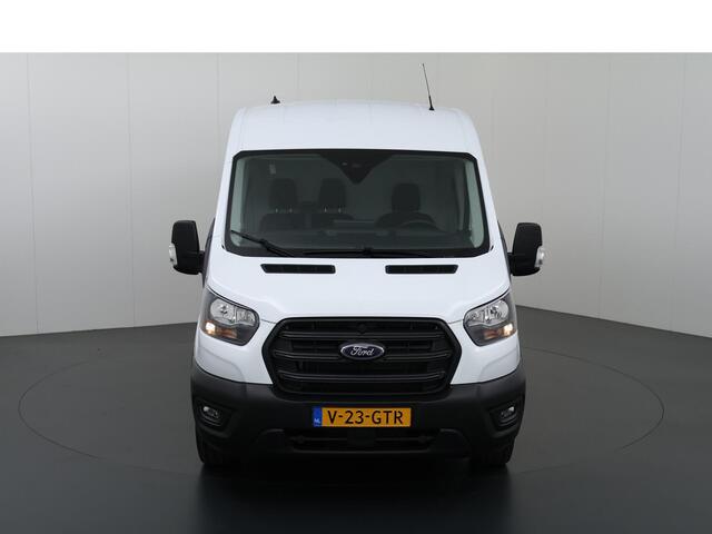 Ford TRANSIT 350 2.0 TDCI L3 H2 Trend Navigatie | Stoelverwarming | Trekhaak 2500 KG AHW | Airco | 3-Zits | NIEUW | Carplay - Android Auto | Laadruimte Pakket | Cruise Control | Multifuntioneel Stuurwiel