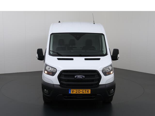 Ford TRANSIT 350 2.0 TDCI L3 H2 Trend | Navigatie | Stoelverwarming | Trekhaak 2500 KG AHW | Airco | 3-Zits | NIEUW | Carplay - Android Auto | Laadruimte Pakket | Cruise Control | Multifuntioneel Stuurwiel