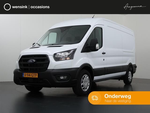 Ford TRANSIT 350 2.0 TDCI L3 H2 Trend | Navigatie | Stoelverwarming | Trekhaak 2500 KG AHW | Airco | 3-Zits | NIEUW | Carplay - Android Auto | Laadruimte Pakket | Cruise Control | Multifuntioneel Stuurwiel