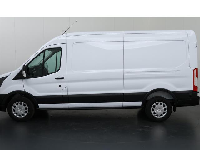 Ford TRANSIT 350 2.0 TDCI | L3 H2 | Trend | Navigatie | Stoelverwarming | Trekhaak 2500 KG AHW | Airco | 3-Zits | NIEUW | Carplay - Android Auto | Laadruimte Pakket | Cruise Control | Multifuntioneel Stuurwiel