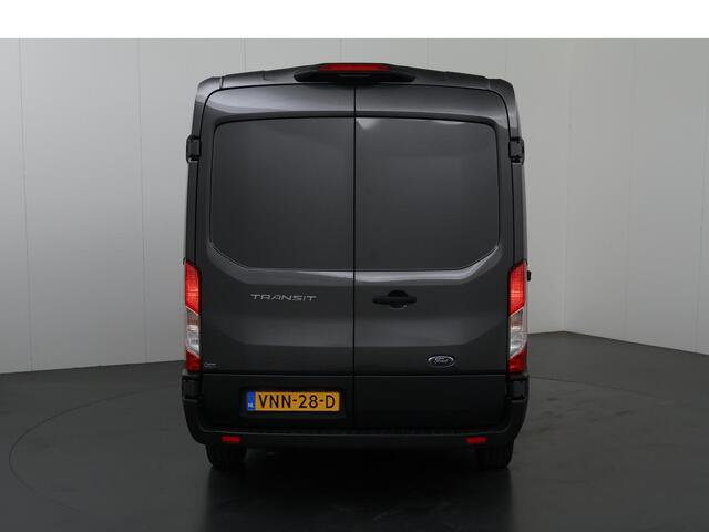 Ford TRANSIT 310 2.0 TDCI L2 H2 Trend | Airco | Cruise Control | Navigatie | 3-zits | Laadruimtebetimmering | Achteruitrijcamera