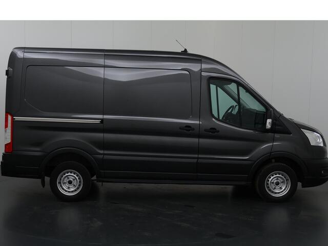 Ford TRANSIT 310 2.0 TDCI L2 H2 Trend | Airco | Cruise Control | Navigatie | 3-zits | Laadruimtebetimmering | Achteruitrijcamera