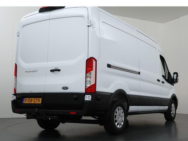 Ford TRANSIT 350 | 2.0 TDCI | L3 H2 | Trend | Navigatie | Stoelverwarming | Trekhaak 2500 KG AHW | Airco | 3-Zits | NIEUW | Carplay - Android Auto | Laadruimte Pakket | Cruise Control | Multifuntioneel Stuurwiel