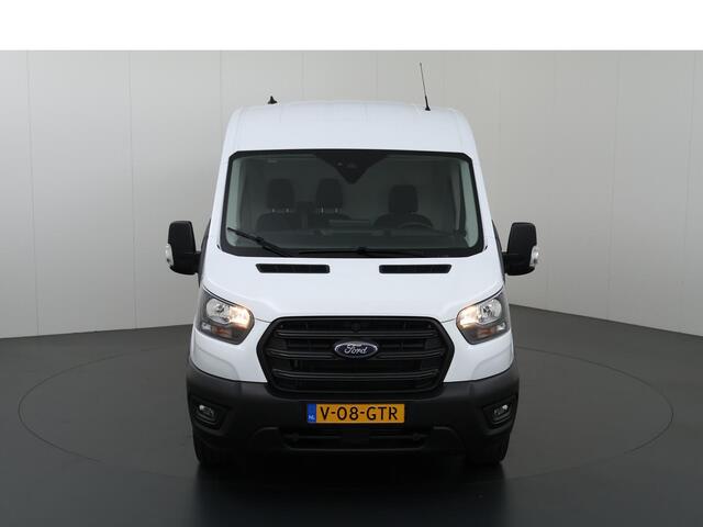 Ford TRANSIT 350 | 2.0 TDCI | L3 H2 | Trend | Navigatie | Stoelverwarming | Trekhaak 2500 KG AHW | Airco | 3-Zits | NIEUW | Carplay - Android Auto | Laadruimte Pakket | Cruise Control | Multifuntioneel Stuurwiel