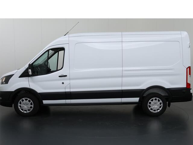 Ford TRANSIT 350 | 2.0 TDCI | L3 H2 | Trend | Navigatie | Stoelverwarming | Trekhaak 2500 KG AHW | Airco | 3-Zits | NIEUW | Carplay - Android Auto | Laadruimte Pakket | Cruise Control | Multifuntioneel Stuurwiel